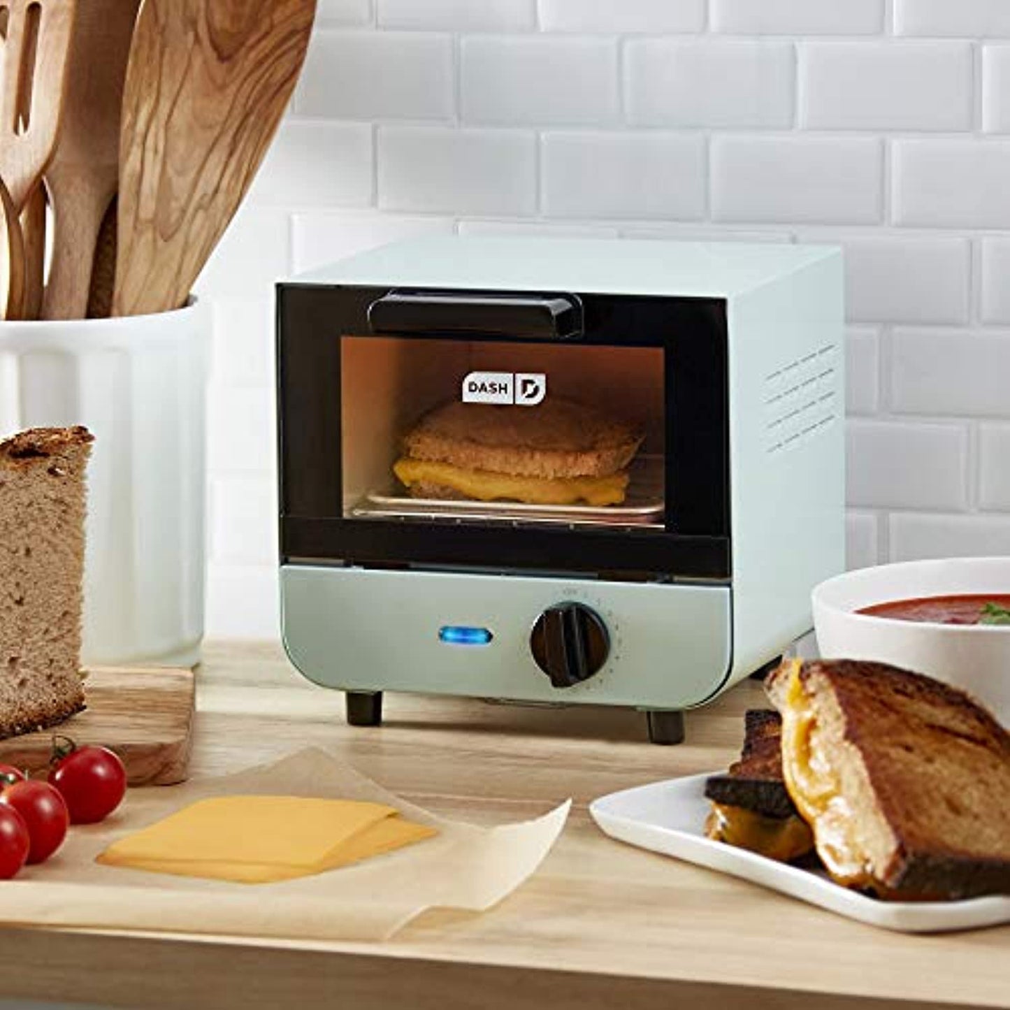 DASH Mini Toaster Oven- Cute/Compact- 550Watts, Teeny Tasty Toasty **OPENBOX